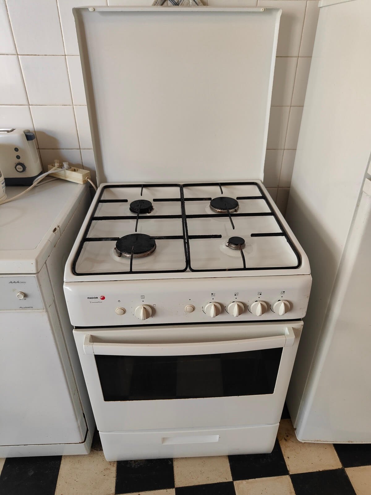 Cuisinière Fagor gaz de ville 4 feux d'occasion avec four intégré